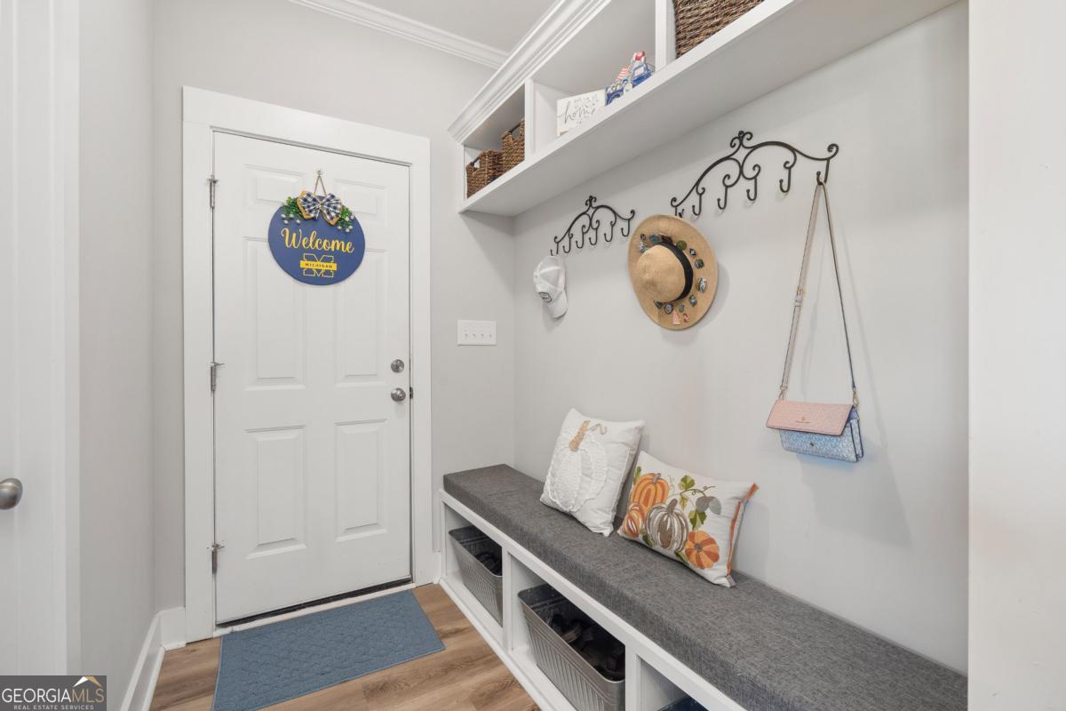 801 Holly Ridge Drive Gray, GA 31032 - Photo 6 of 51 a view of an entryway with wall paintings
