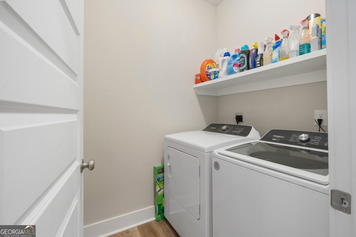 801 Holly Ridge Drive Gray, GA 31032 - Photo 7 of 51 a utility room with dryer and washer