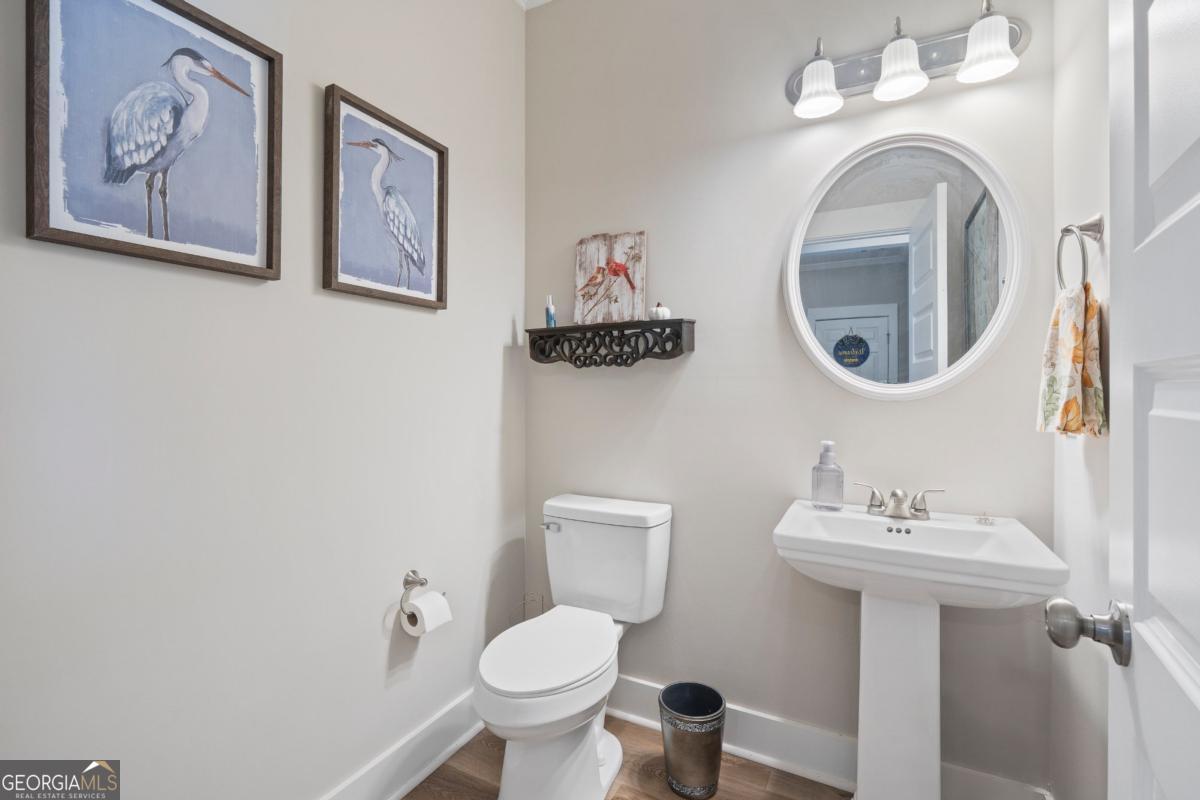801 Holly Ridge Drive Gray, GA 31032 - Photo 9 of 51 a bathroom with a toilet and a sink