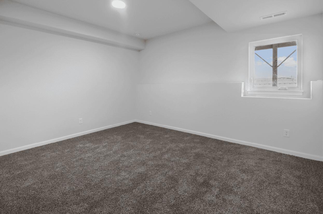 3103 West 82nd Place, Unit 52B Merrillville, IN 46410 - Photo 14 of 18 an empty room with a window