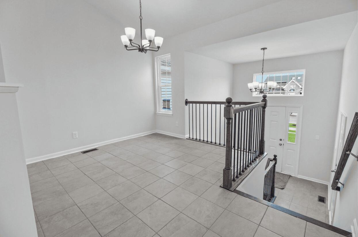 3103 West 82nd Place, Unit 52B Merrillville, IN 46410 - Photo 2 of 18 a view of a chandelier in a room