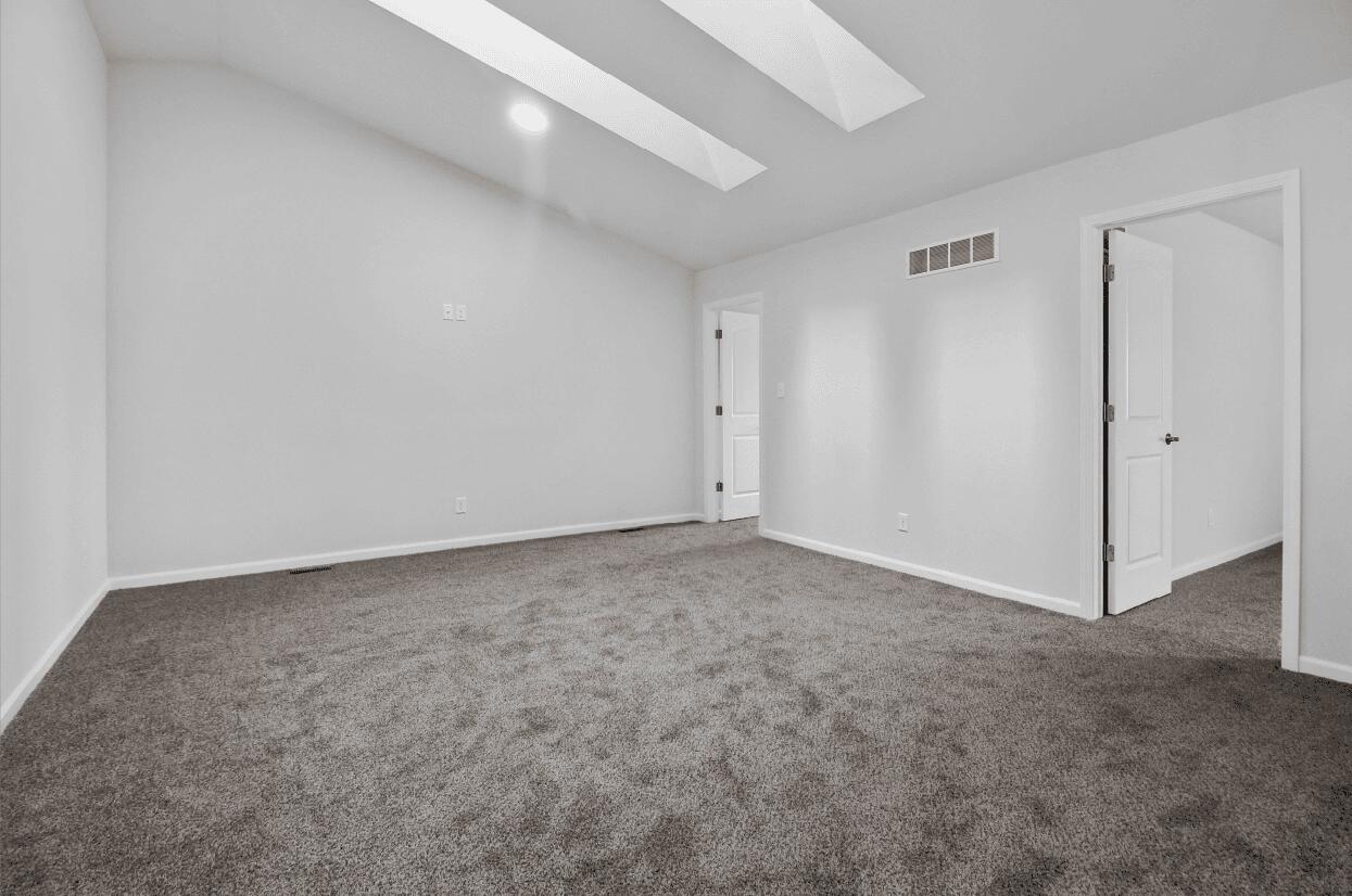 3103 West 82nd Place, Unit 52B Merrillville, IN 46410 - Photo 5 of 18 a view of an empty room