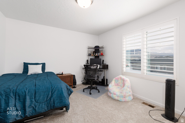 540 Lefty Lane Tooele, UT 84074 - Photo 17 of 48 Carpeted bedroom featuring baseboards and an office area