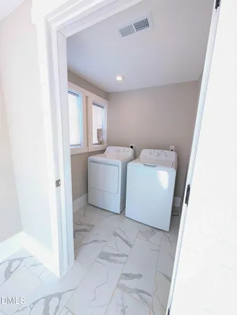 a room with a washer and dryer