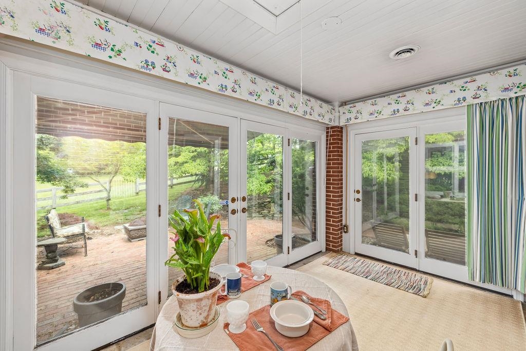 188 Middlebrook Road Staunton, VA 24401 - Photo 29 of 75 a living room with furniture and a potted plant