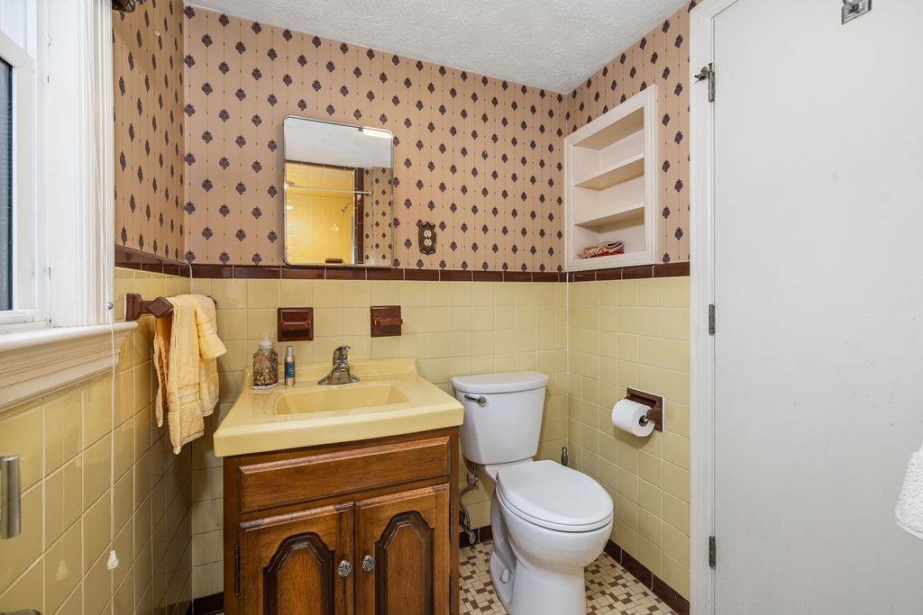 188 Middlebrook Road Staunton, VA 24401 - Photo 37 of 75 a bathroom with a sink toilet and mirror