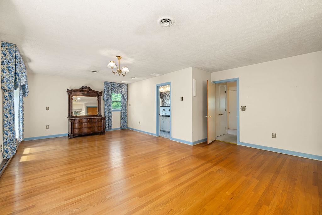 188 Middlebrook Road Staunton, VA 24401 - Photo 46 of 75 a view of an empty room with a window and a kitchen