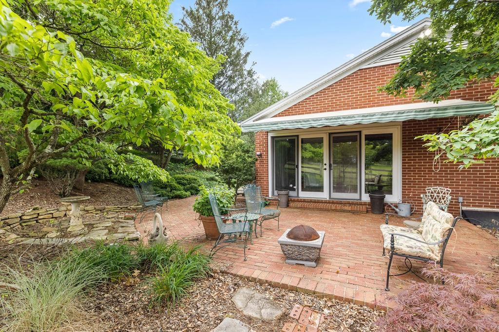 188 Middlebrook Road Staunton, VA 24401 - Photo 66 of 75 a view of a patio with table and chairs and potted plants