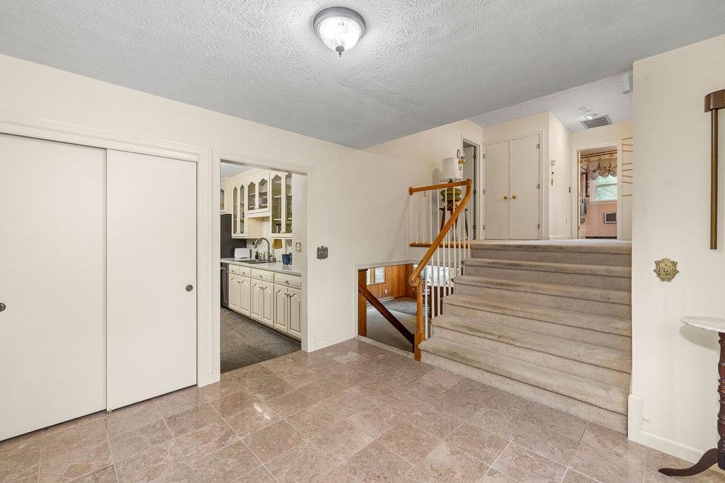 188 Middlebrook Road Staunton, VA 24401 - Photo 10 of 75 a view of a hallway with stairs and furniture