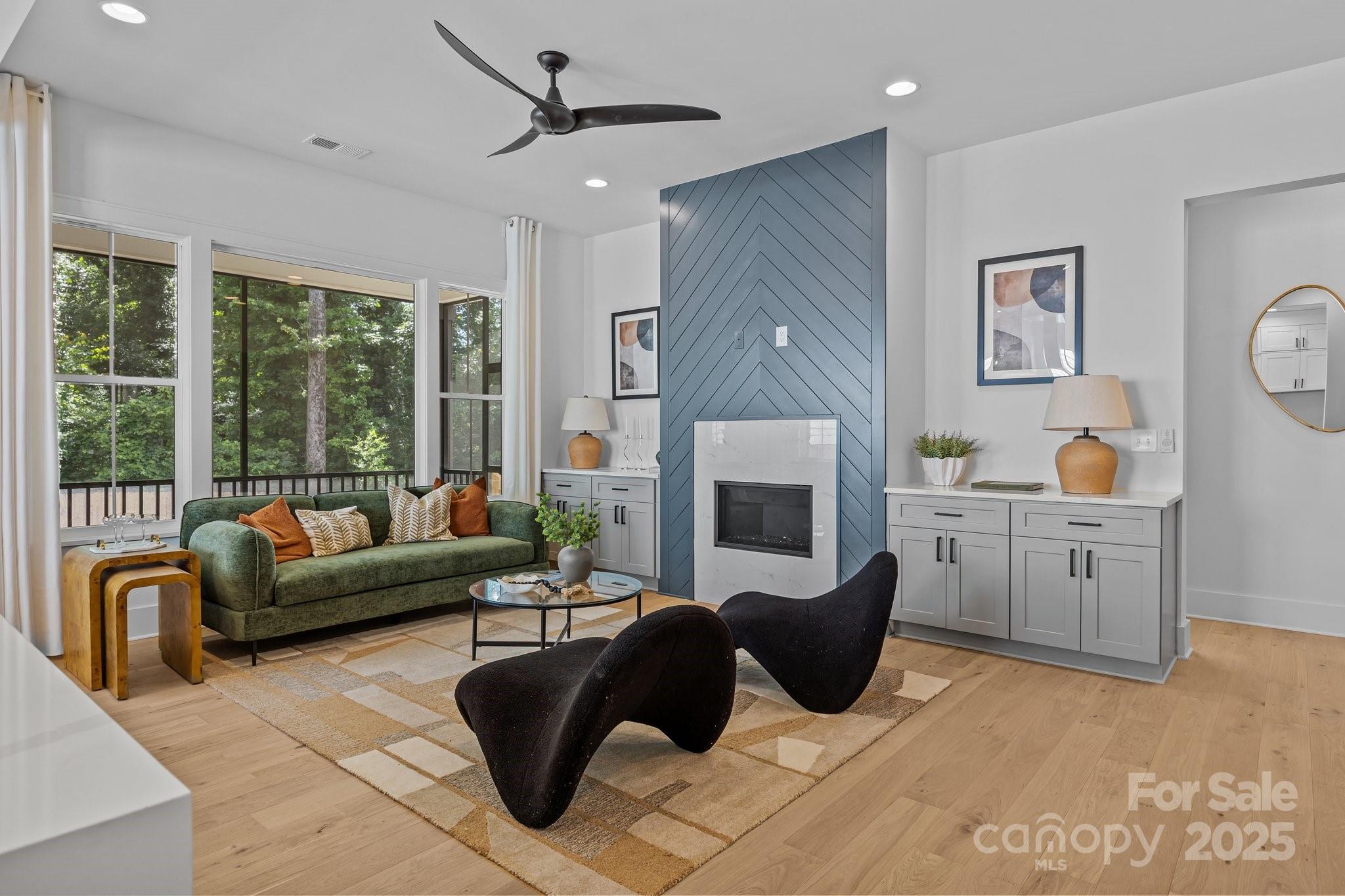 3949 Plainview Road Charlotte, NC 28208 - Photo 20 of 42 a living room with furniture and a fireplace