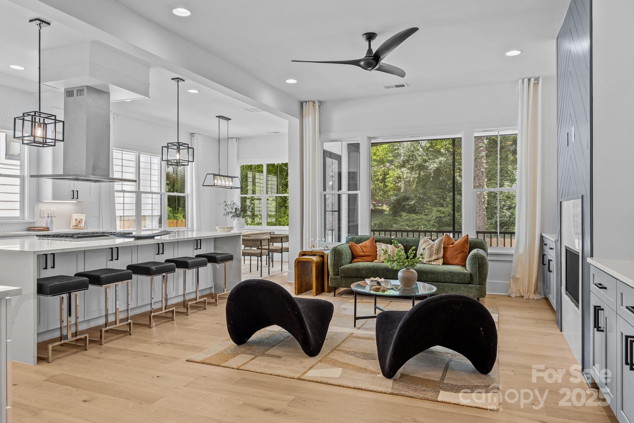 3949 Plainview Road Charlotte, NC 28208 - Photo 21 of 42 a living room with furniture and large windows