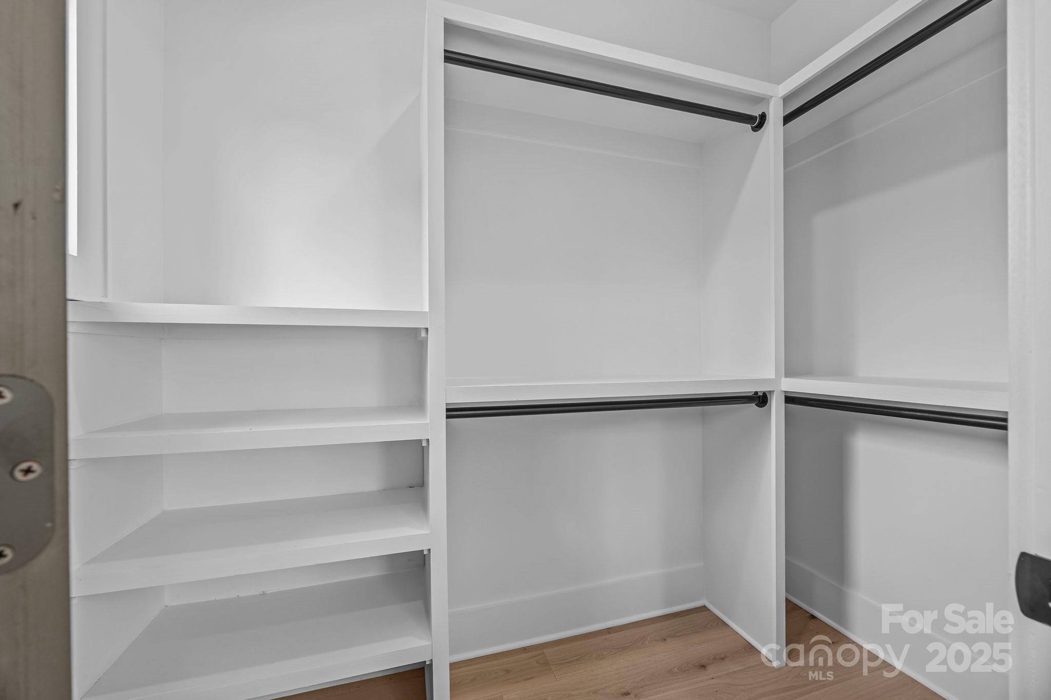 3949 Plainview Road Charlotte, NC 28208 - Photo 38 of 42 a view of an empty walk in closet