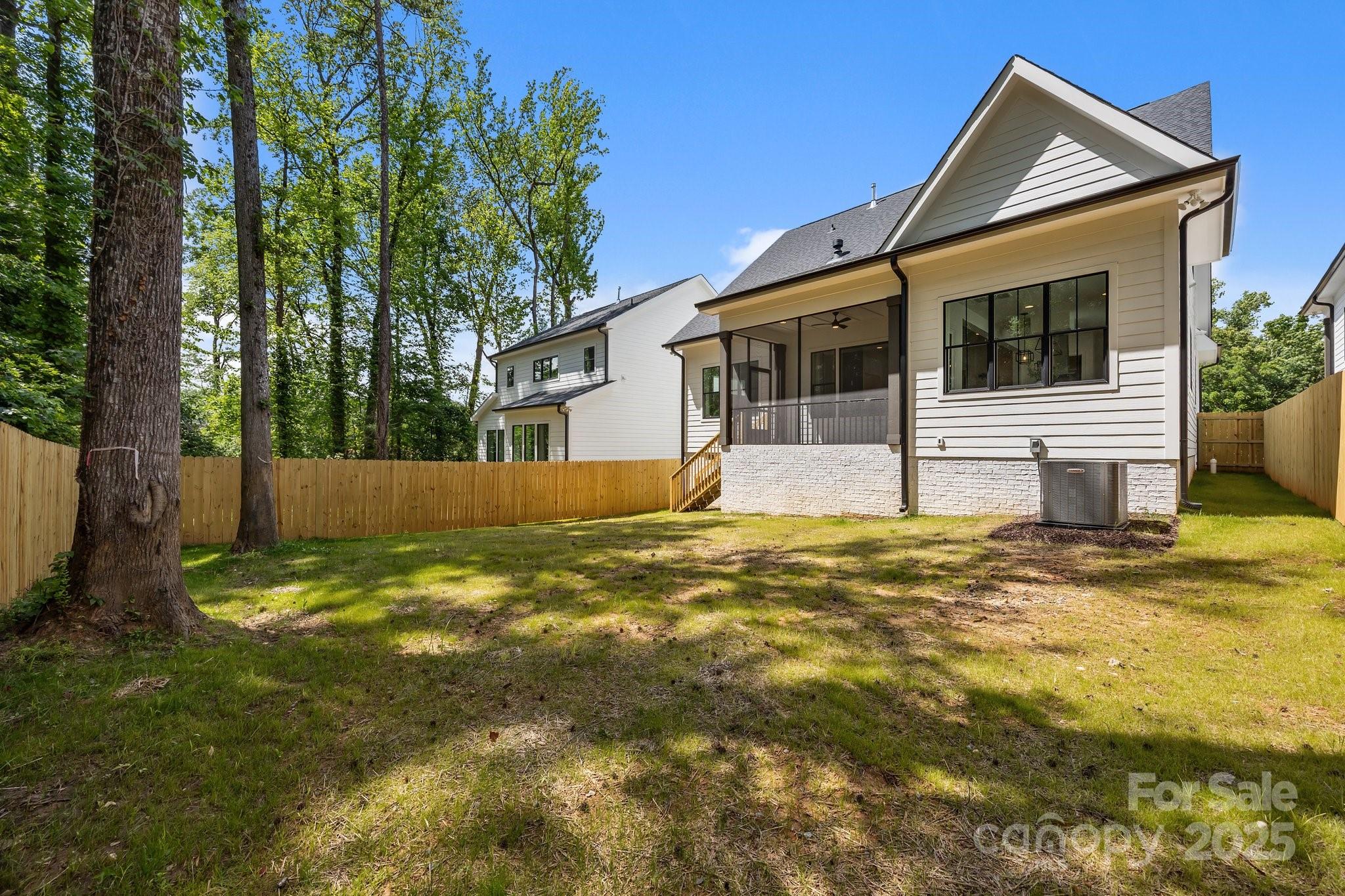 3949 Plainview Road Charlotte, NC 28208 - Photo 7 of 42 a view of a house with a yard