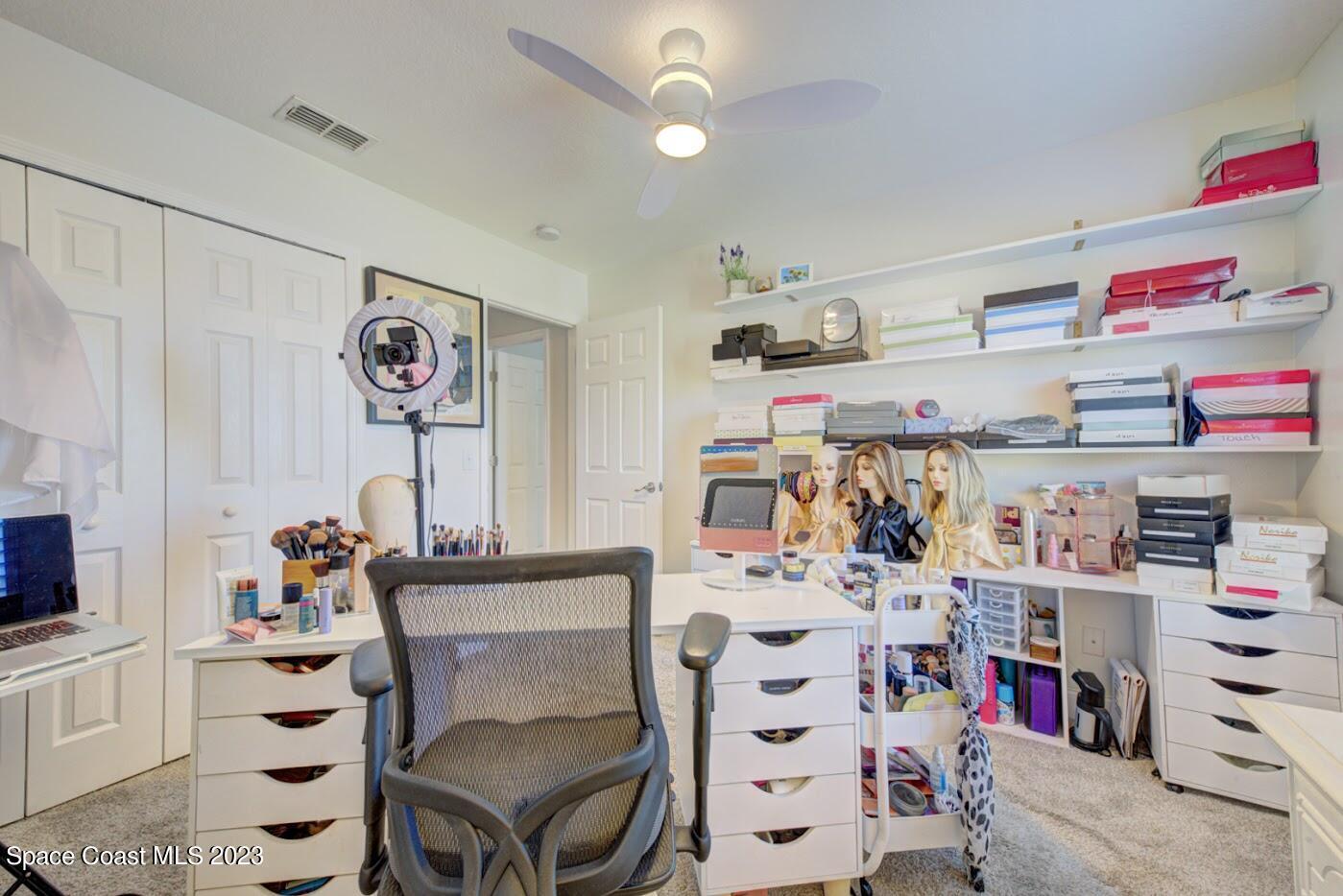 2760 Revolution Street, Unit 103 Melbourne, FL 32935 - Photo 31 of 40 a room with furniture and baby bed