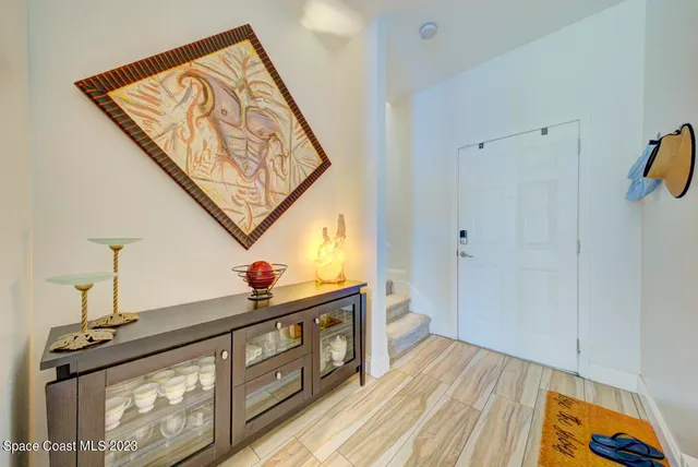 a kitchen with stainless steel appliances kitchen island granite countertop a sink and a stove