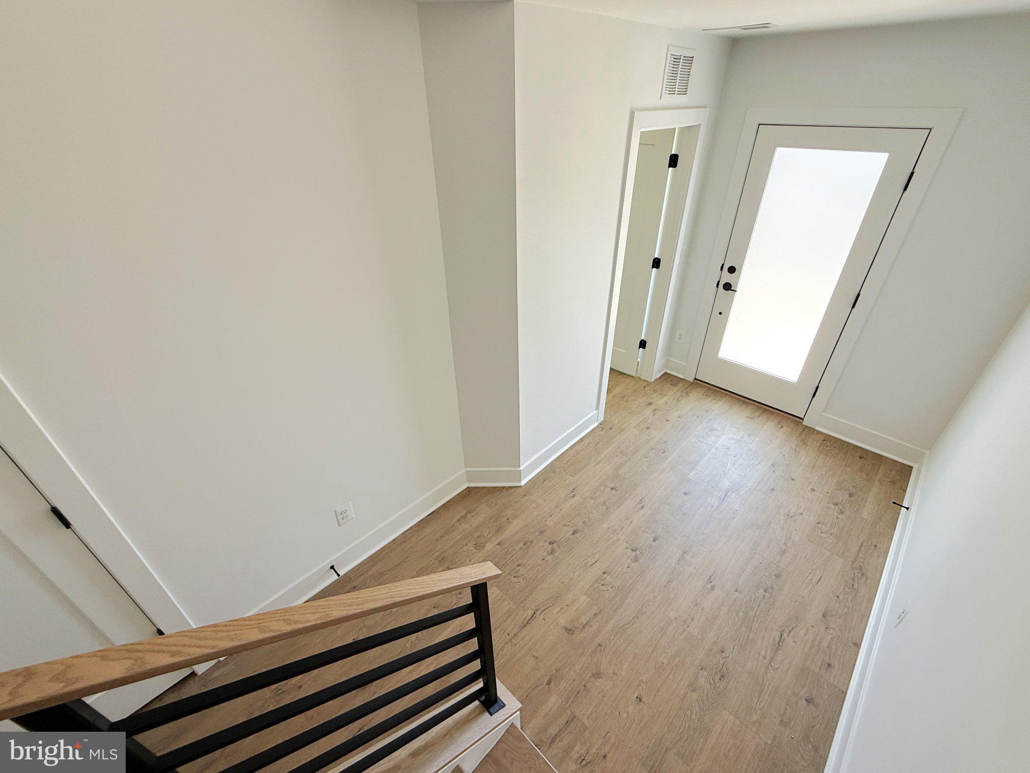 33 Lower Service Court Northwest Washington, DC 20001 - Photo 9 of 51 Bright and inviting entryway space.
