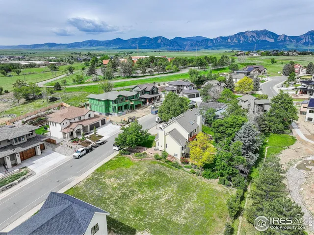 an aerial view of residential house with outdoor space