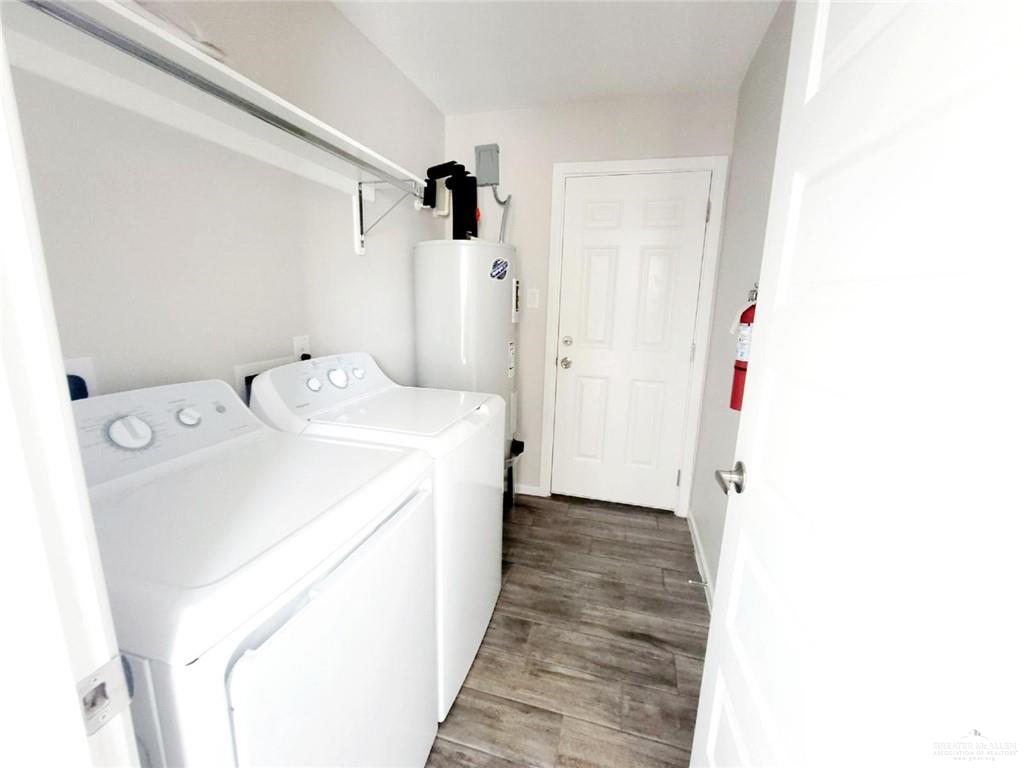 1420 Alta Vista Drive, Unit 4 Weslaco, TX 78596 - Photo 13 of 14 a utility room with dryer and washer