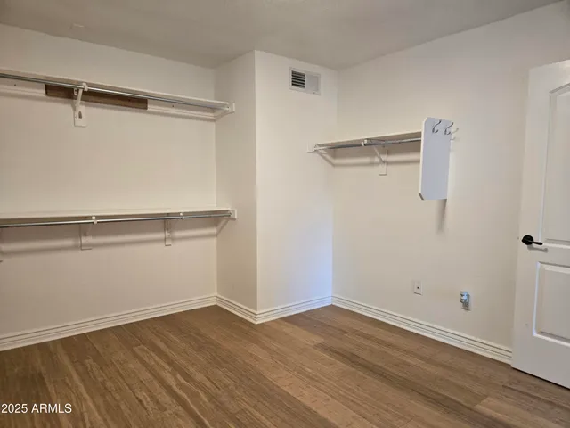 a view of a room with racks on the wall