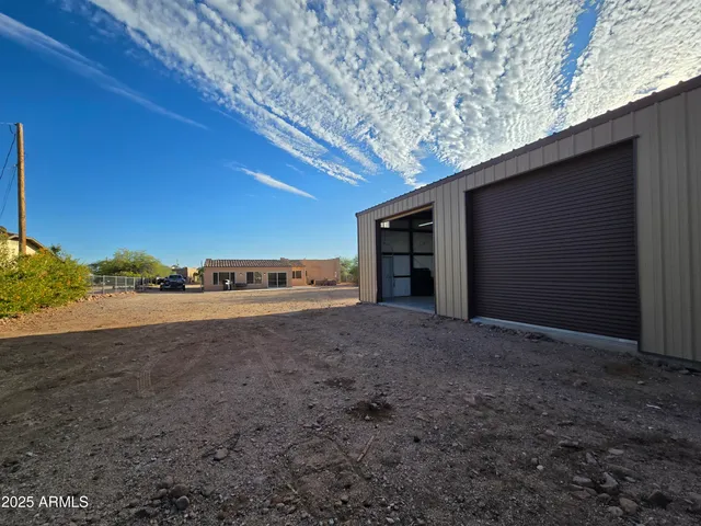 a view of a house with a street