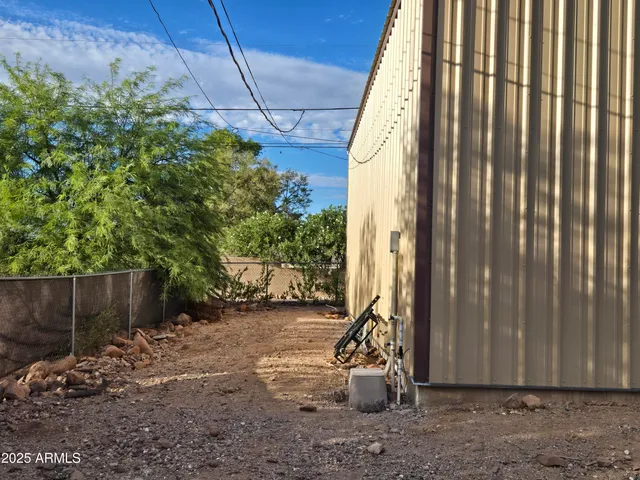 a view of a empty room with a garage