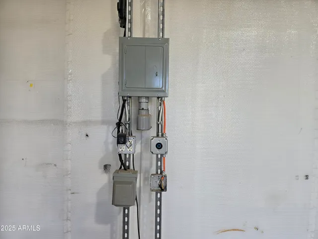 a view of a house with a street