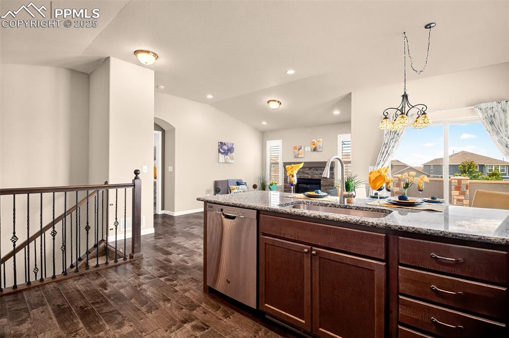 4293 Hessite Loop Colorado Springs, CO 80938 - Photo 14 of 37 a kitchen with sink and cabinets