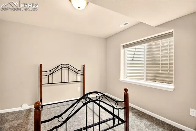 a view of staircase with a window