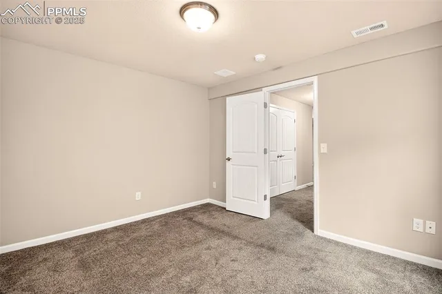 an empty room with an entryway
