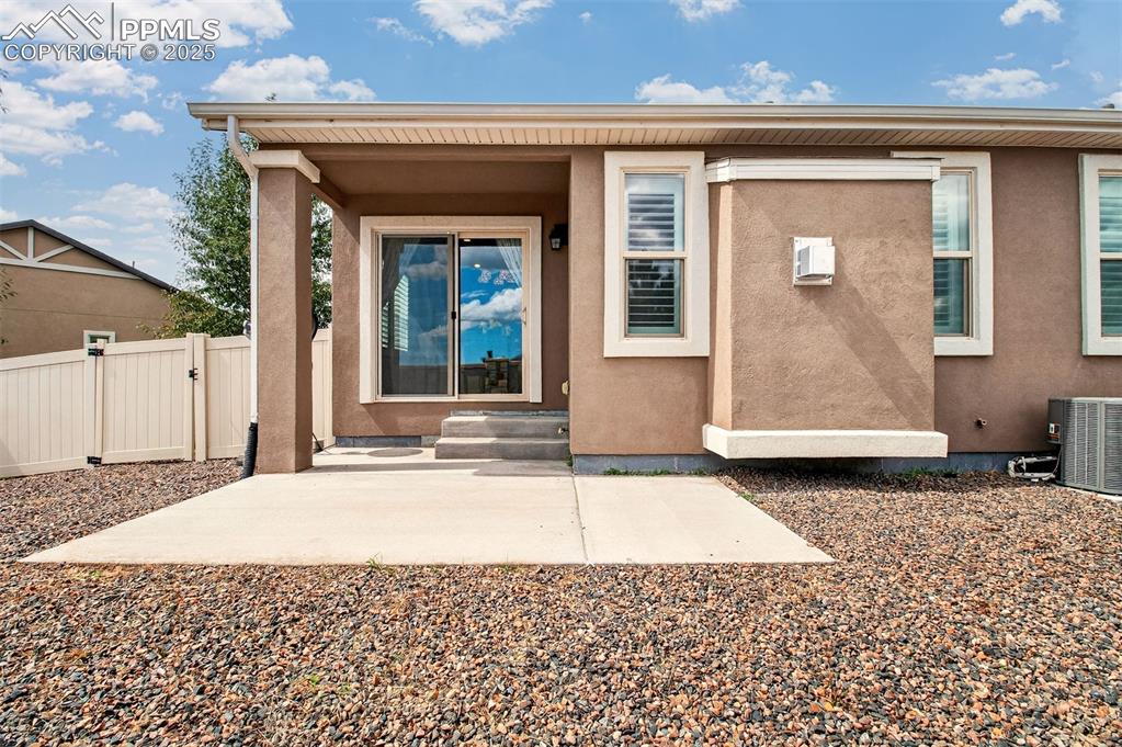 4293 Hessite Loop Colorado Springs, CO 80938 - Photo 32 of 37 a front view of a house with a yard
