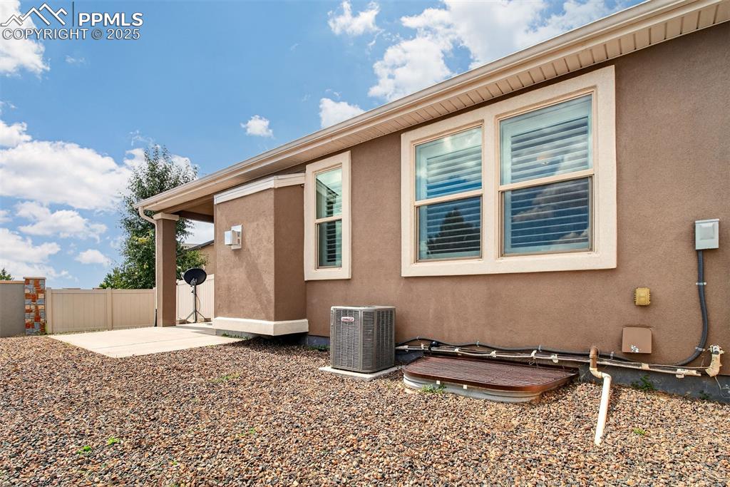 4293 Hessite Loop Colorado Springs, CO 80938 - Photo 33 of 37 a front view of a house with garden