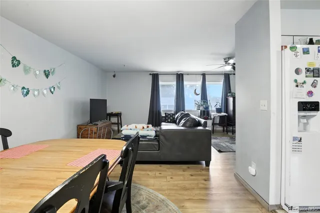 a living room with fireplace furniture and a flat screen tv