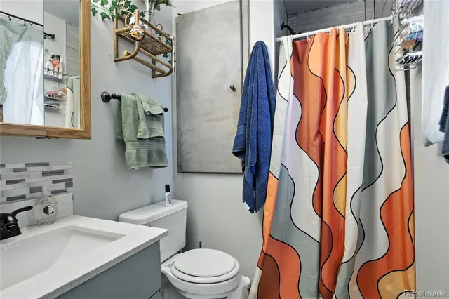 a bathroom with a sink and a toilet