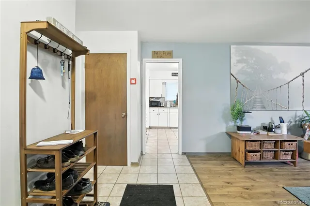 a living room with furniture and a table