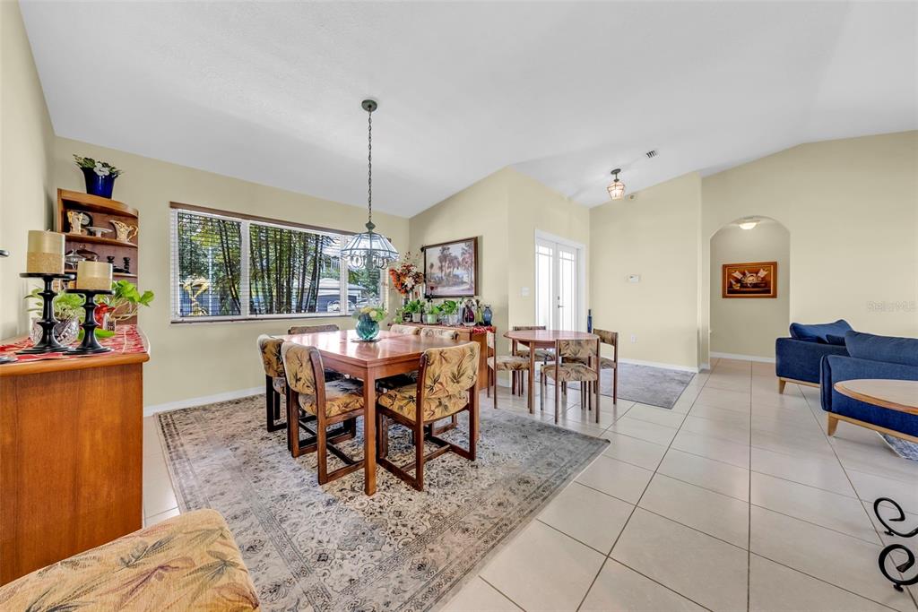 21131 Southwest 128th Court Miami, FL 33177 - Photo 7 of 24 a view of a dining room with furniture