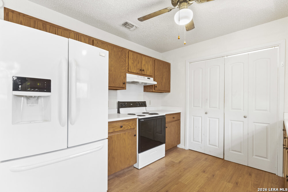 292 Montague Drive Bandera, TX 78003 - Photo 11 of 24 a kitchen with stainless steel appliances a refrigerator and a stove
