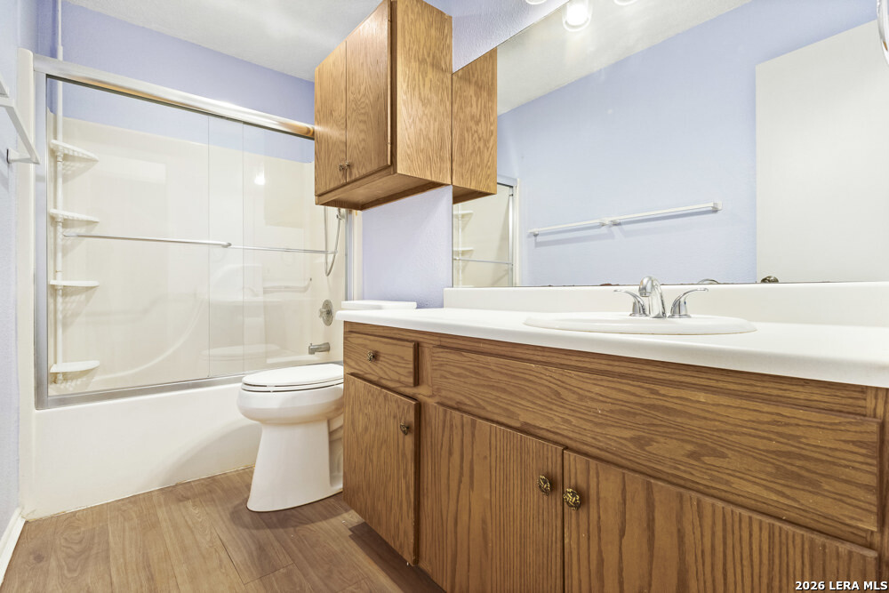 292 Montague Drive Bandera, TX 78003 - Photo 17 of 24 a bathroom with a sink and a mirror