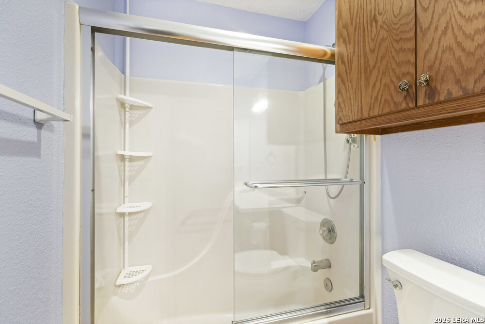 292 Montague Drive Bandera, TX 78003 - Photo 18 of 24 a bathroom with a shower