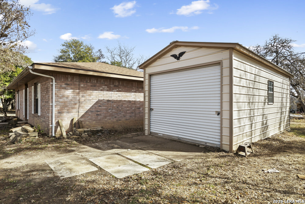 292 Montague Drive Bandera, TX 78003 - Photo 4 of 24 a front view of a house with a yard