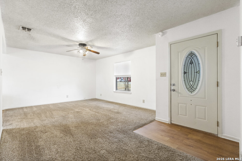 292 Montague Drive Bandera, TX 78003 - Photo 6 of 24 a view of a livingroom with a washer and dryer