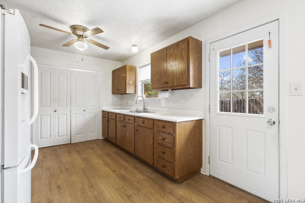 292 Montague Drive Bandera, TX 78003 - Photo 10 of 24 a spacious bathroom with a double vanity sink a mirror and shower
