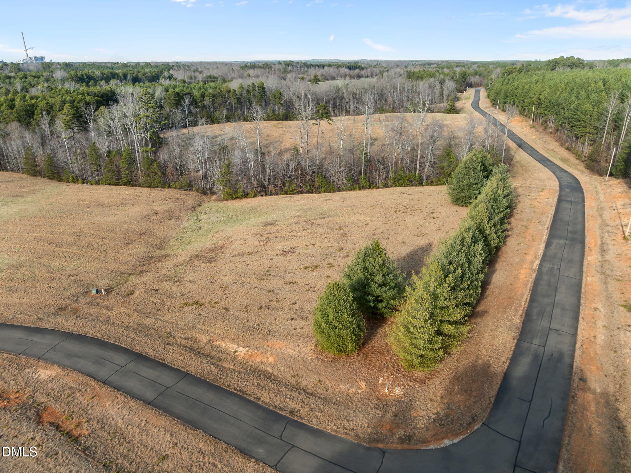 2-acres Fishers Court Roxboro, NC 27574 - Photo 14 of 14 a view of a yard with wooden fence