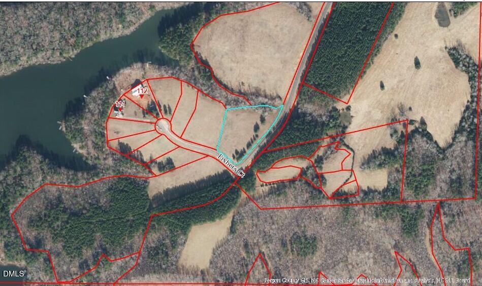 2-acres Fishers Court Roxboro, NC 27574 - Photo 2 of 14 an aerial view of a house with outdoor space and a lake view