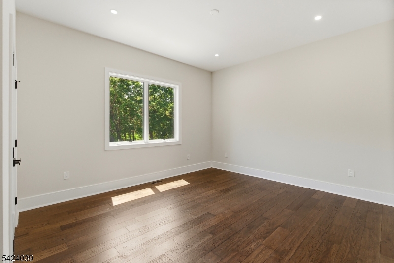 45 Kildee Road Belle Mead, NJ 08502 - Photo 14 of 43 an empty room with wooden floor and windows