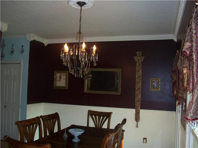 3050 Nicole Road Clarksville, TN 37040 - Photo 9 of 20 Large formal dining room with hardwood floor and beautiful crown moulding.