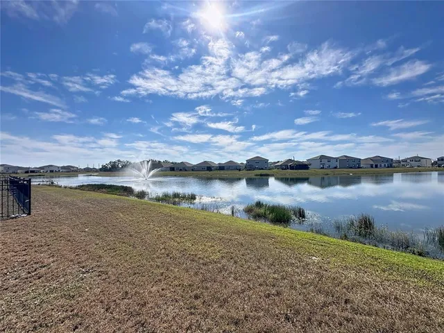 a view of a lake from a yard