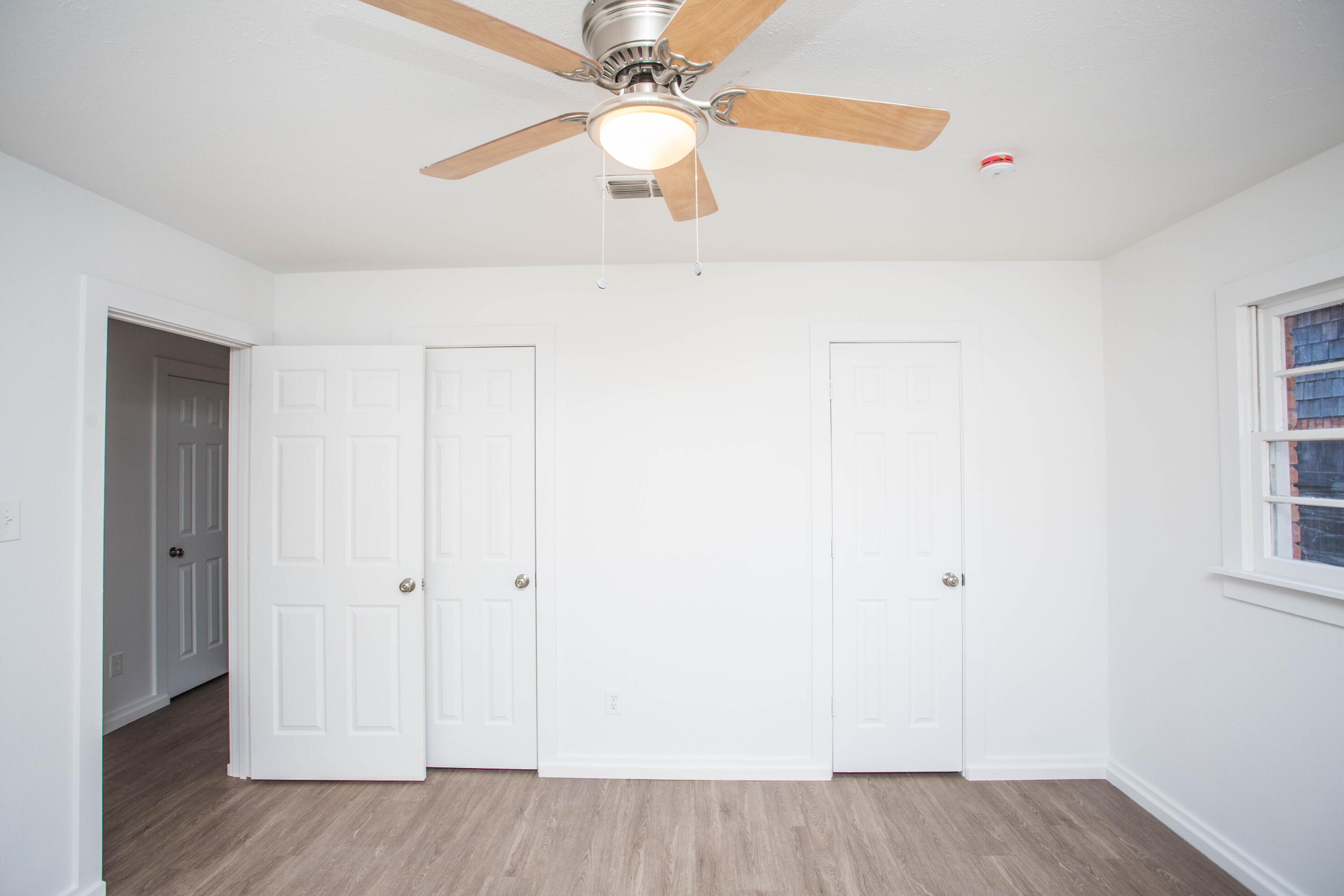 6004 Vernon Avenue Lubbock, TX 79412 - Photo 17 of 34 wooden floor in an empty room