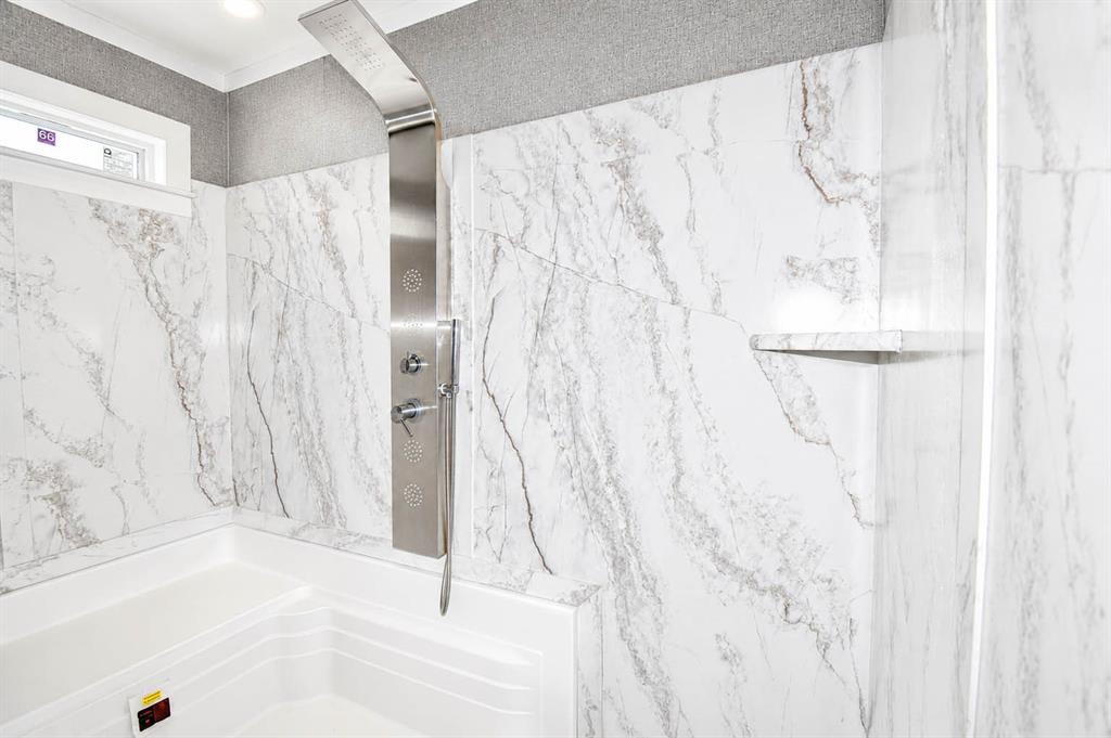 8228 Us Highway Rochelle, TX 76872 - Photo 17 of 36 a bathroom with a shower curtain and a bathtub