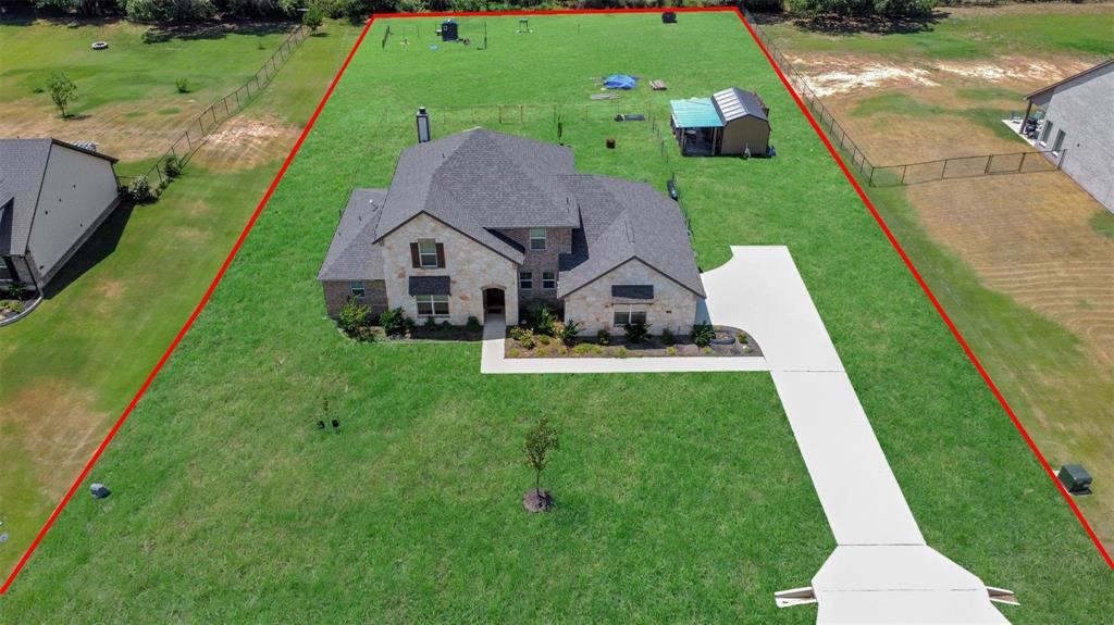 154 Chester Road Springtown, TX 76082 - Photo 2 of 40 a view of a garden with swimming pool
