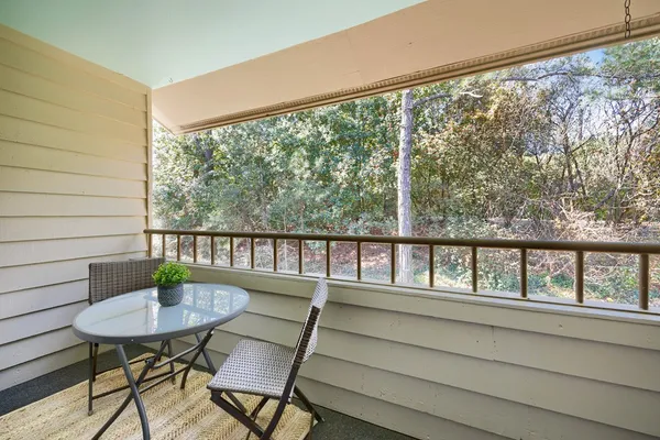 a view of a city from a dining room with a large window